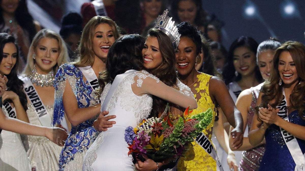 Contestants congratulate Miss France Iris Mittenaere after she was declared winner in the Miss Universe beauty pageant at the Mall of Asia Arena, in Pasay, Metro Manila. Reuters