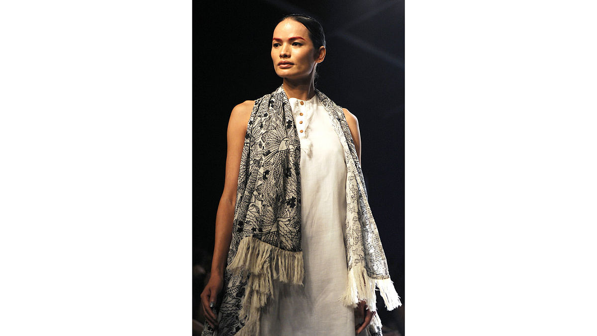 Nepal`s first transgender model Anjali Lama showcases a creation by designer Gen Next at Lakmé Fashion Week Summer Resort 2017 in the Indian city of Mumbai February 1, 2017. Photo: AFP