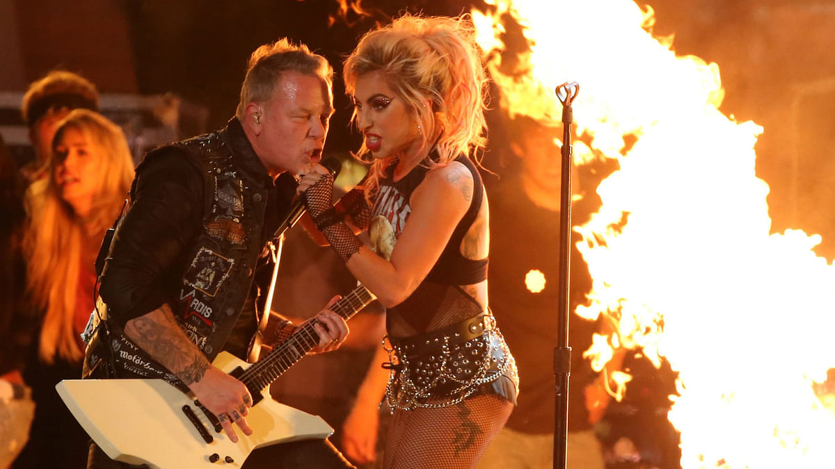 Metallica`s James Hetfield and Lady Gaga perform `Moth into Flame` at the 59th Annual Grammy Awards in Los Angeles. Reuters