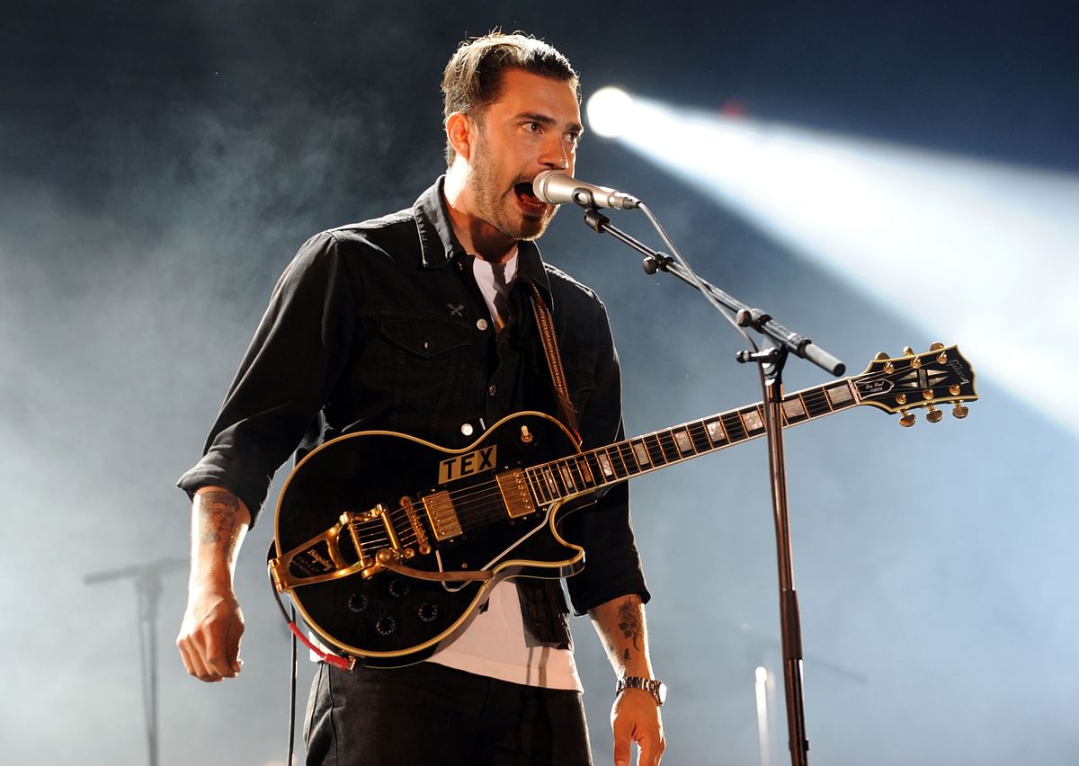 This file photo taken on 20 July, 2013 shows singer Hanni El Khatib performing at the Vieilles Charrues Festival in Carhaix-Plouguer, western France. Photo: AFP