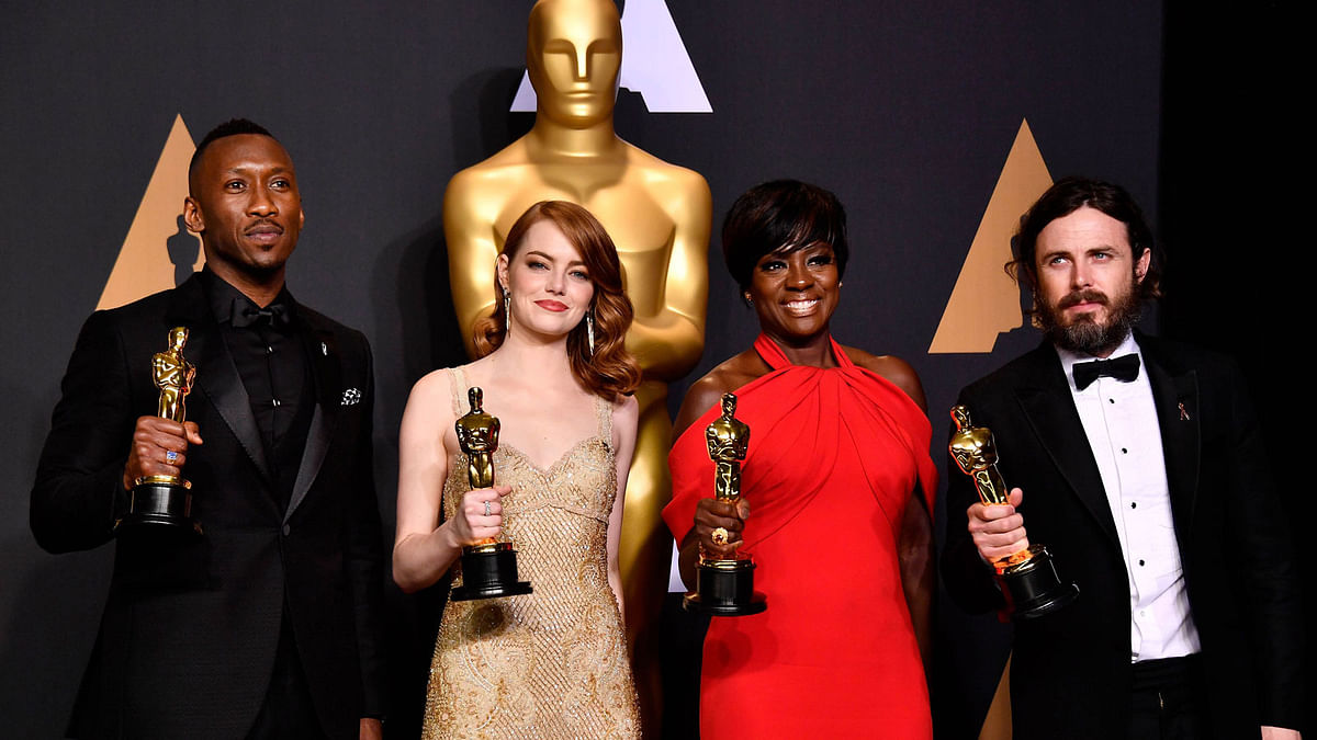 (L-R) Actors Mahershala Ali, winner of Best Supporting Actor for `Moonlight,` Emma Stone, winner of Best Actress for `La La Land,` Viola Davis, winner of the Best Supporting Actress award for `Fences,` and Casey Affleck, winner of Best Actor for `Manchester by the Sea,` pose in the press room during the 89th Annual Academy Awards at Hollywood & Highland Center on February 26, 2017 in Hollywood, California. Photo: AFP