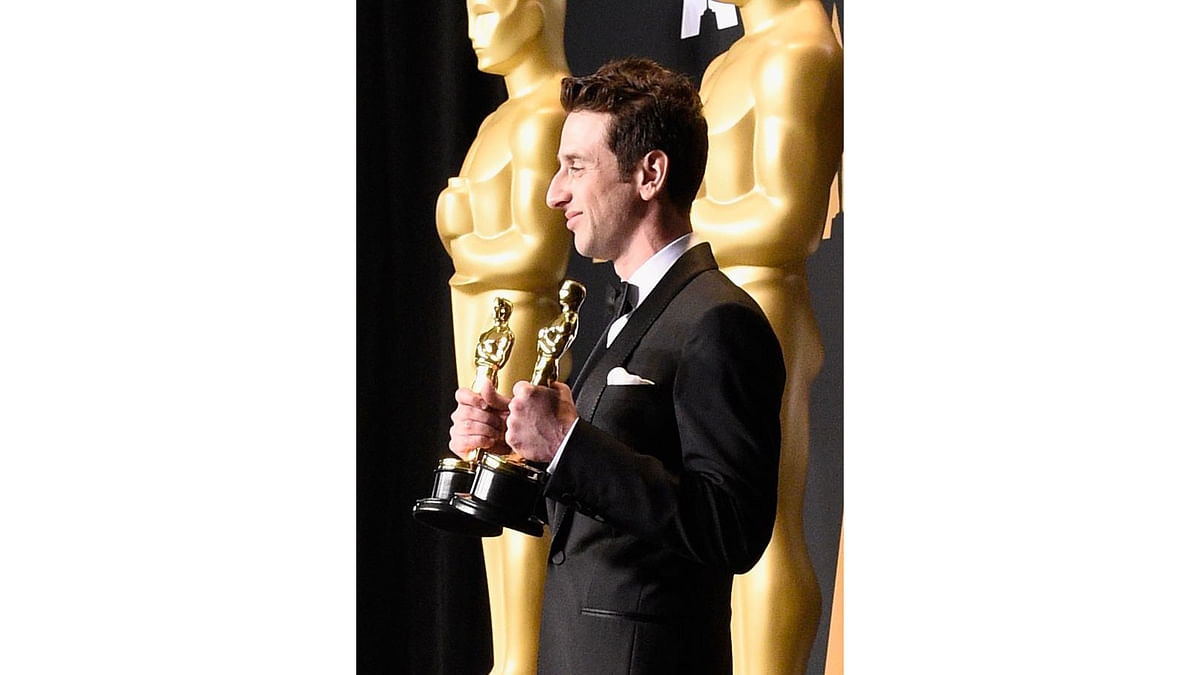 Composer Justin Hurwitz, winner of the awards for Music (Original Song) (for `City of Stars`) and Music (Original Score) for `La La Land,` poses in the press room during the 89th Annual Academy Awards at Hollywood & Highland Center on February 26, 2017 in Hollywood, California. Photo: AFP