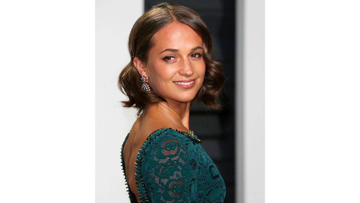 Swedish actress Alicia Vikander poses as she arrives to the Vanity Fair Party following the 88th Academy Awards at The Wallis Annenberg Center for the Performing Arts in Beverly Hills, California, on February 26, 2017. Photo: AFP