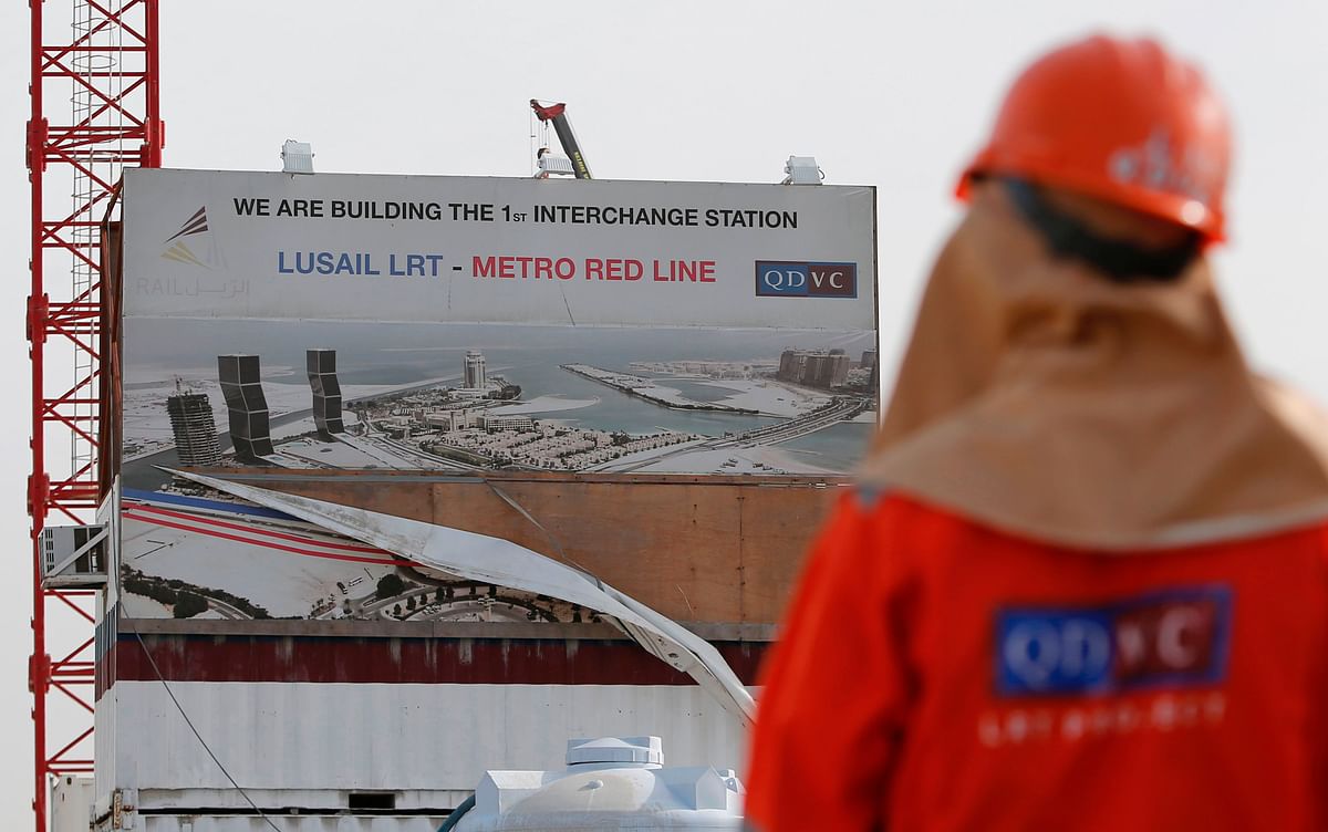 A worker of QDVC (Qatari Diar/VINCI Construction Grands Projets), the Qatari branch of French construction giant Vinci, walking at the construction site of a new metro line in the capital Doha. AFP file photo