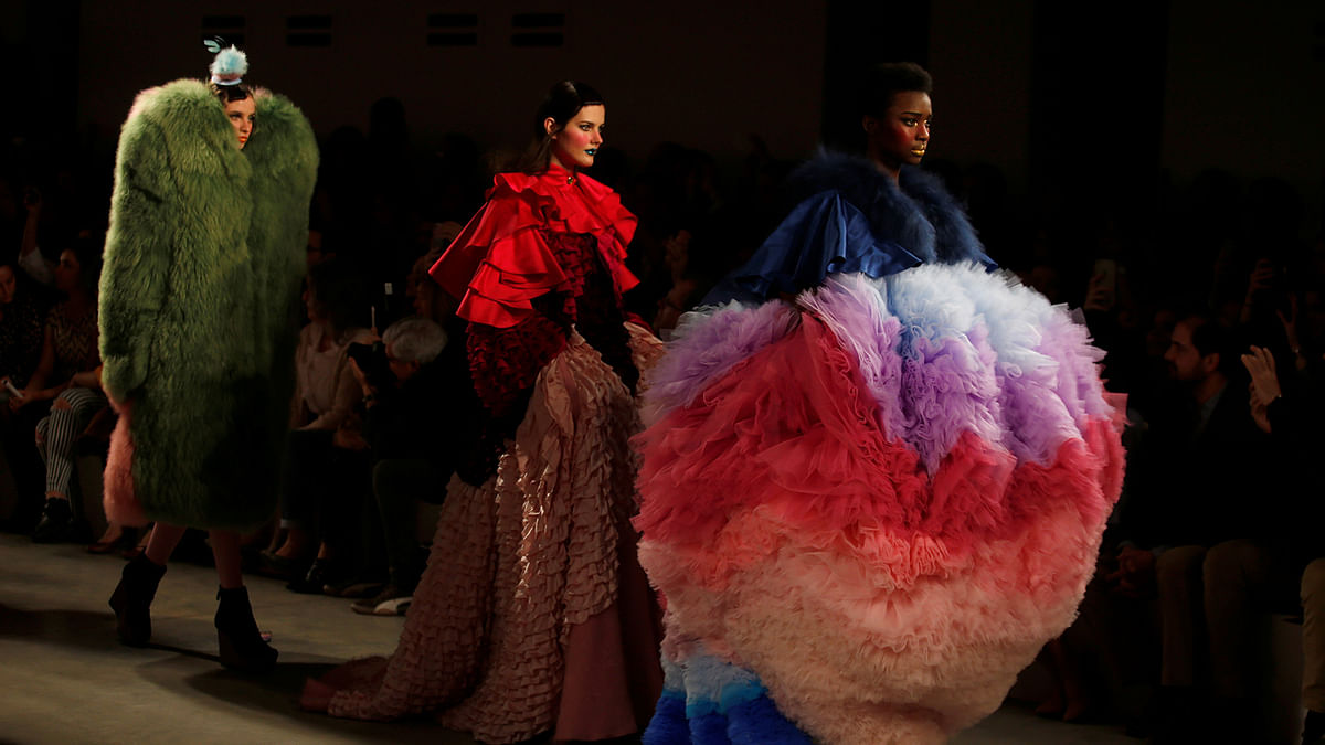Models present creations by designer David Ferreira, as part of his Fall/Winter 2017/18 collection, during Lisbon Fashion Week, Portugal, March 10, 2017. Photo: Reuters