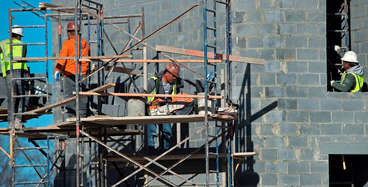 Construction workers are seen as they build an apartment building in Fairfax, Virginia. AFP file photo