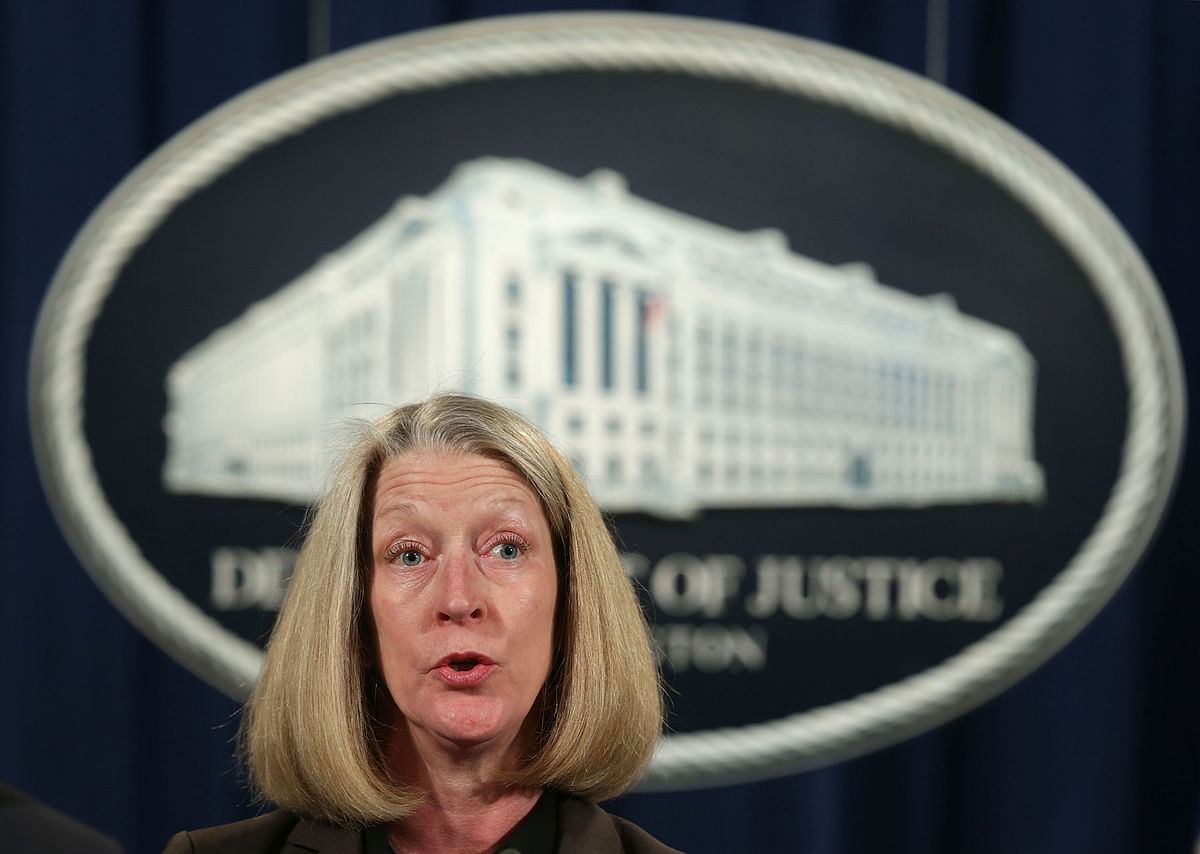 Acting Assistant Attorney General Mary McCord speaks during a news conference at the Justice Department. Photo: AFP