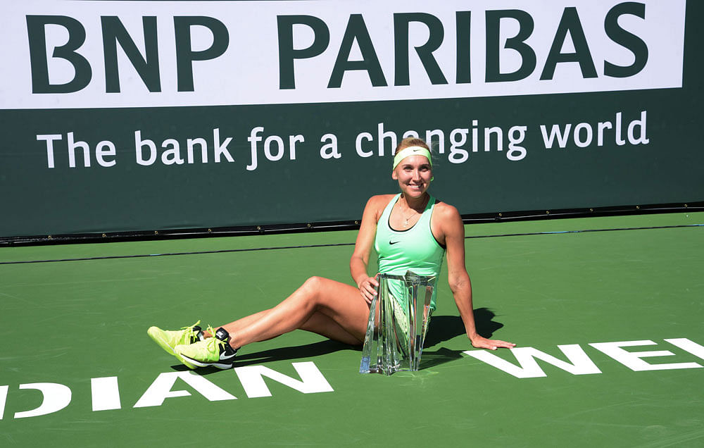 Elena Vesnina of Russia holds the BNP Paribas Open trophy at Indian Wells Tennis Garden on March 19, 2017 in Indian Wells. AFP