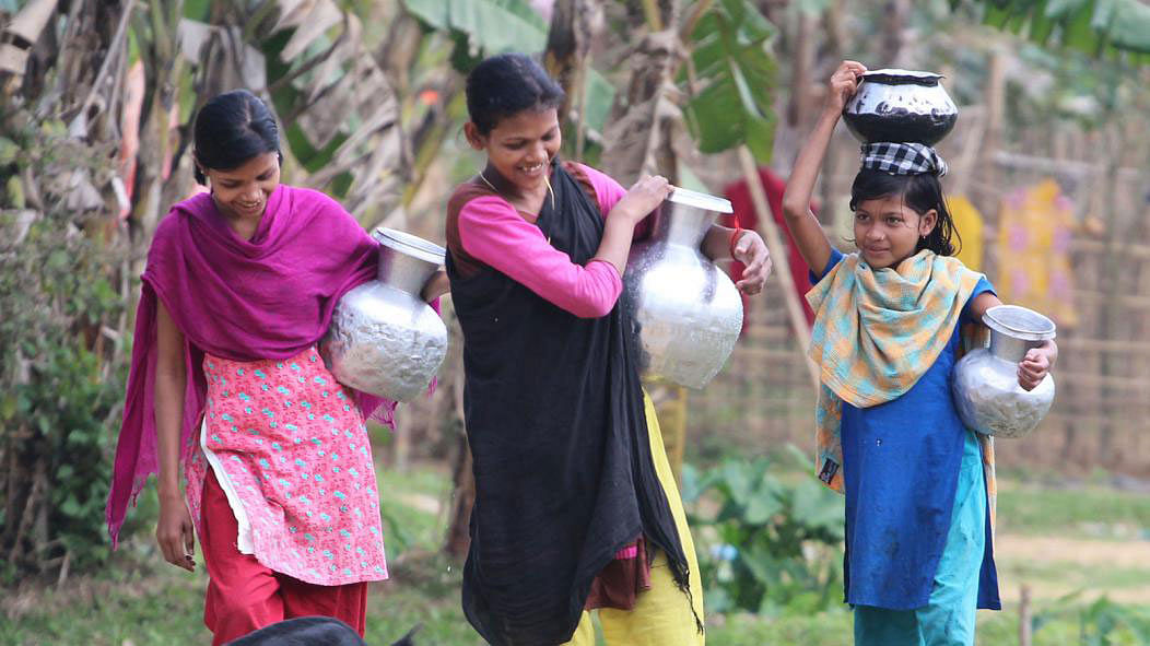 Pure water is still scarce in the tea garden areas in Sylhet. The inhabitants of that area have to collect drinkable water from far away every day. The photo was taken at Lakkatura tea garden area on 21 March. Photo: Anis Mahmud