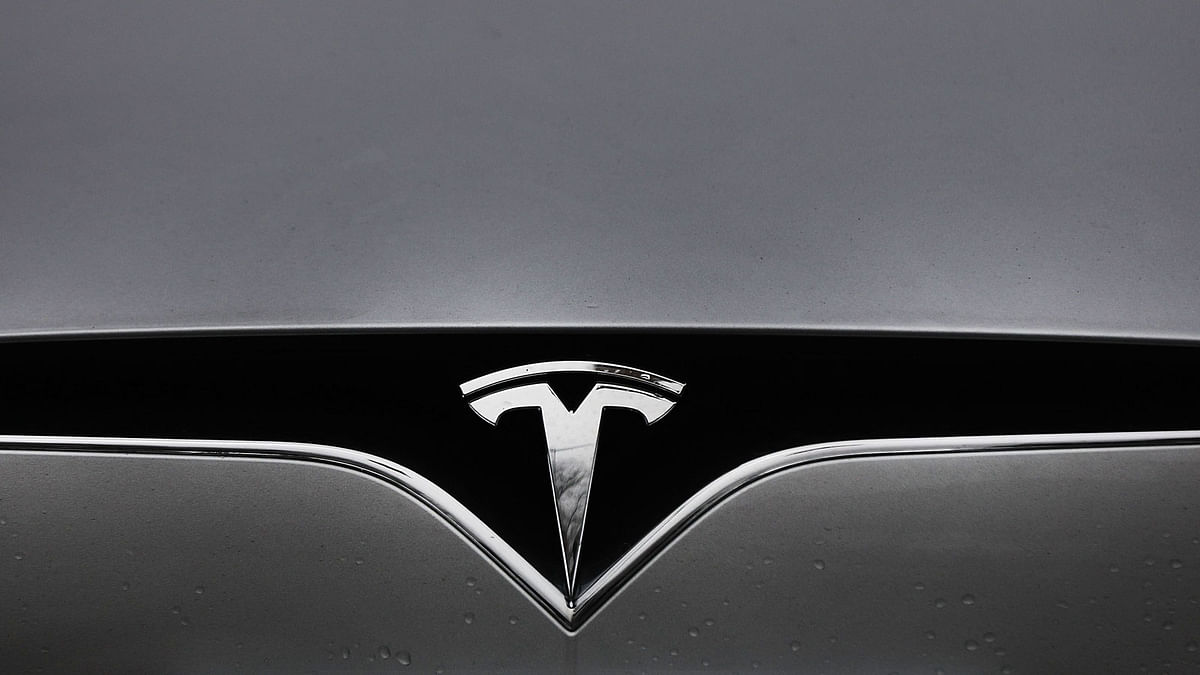A Tesla car sits outside of a showroom at a Brooklyn Tesla dealership in New York City, US. Photo: AFP
