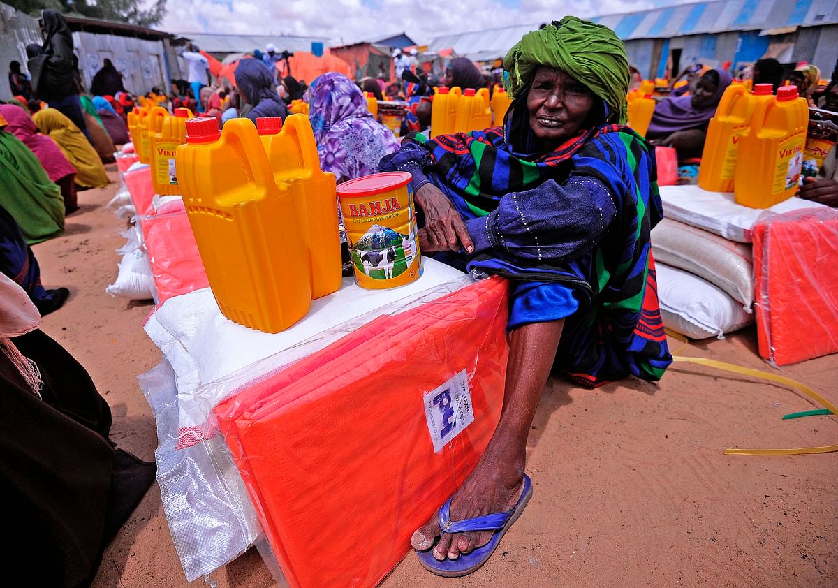 A displaced Somali waits for food and water at an aid distribution centre outside Mogadishu. Photo: AFP