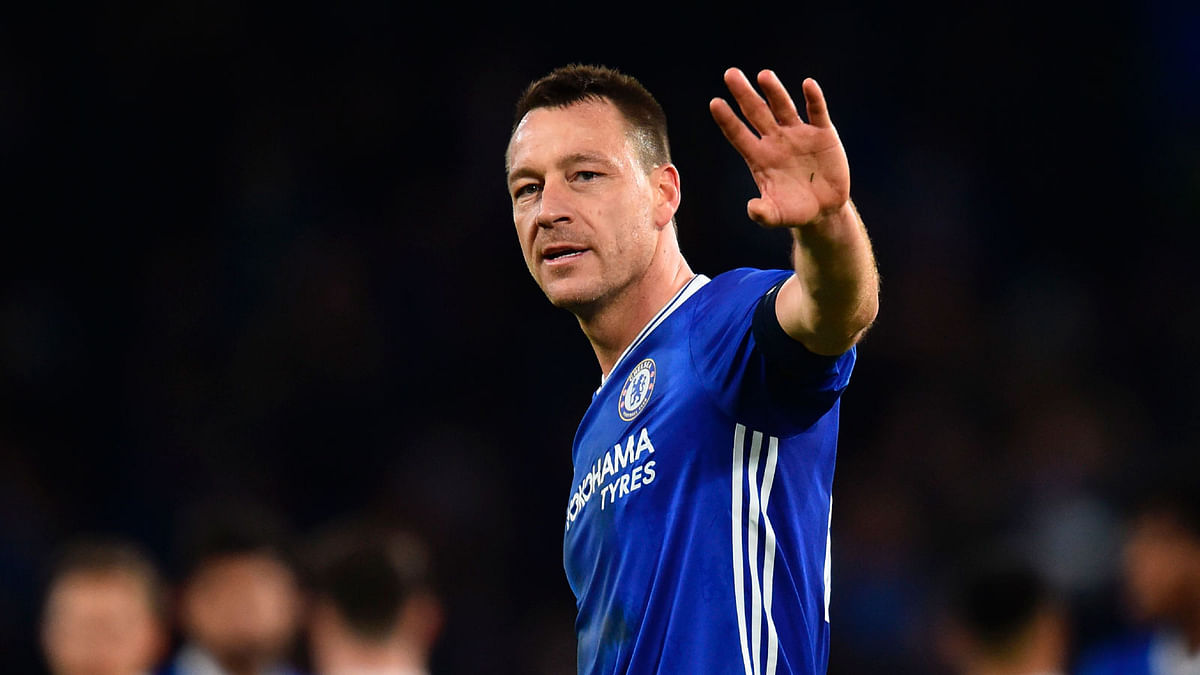 Chelsea’s English defender John Terry waving at the end of the English FA Cup fourth round football match between Chelsea and Brentford at Stamford Bridge in London. AFP file photo