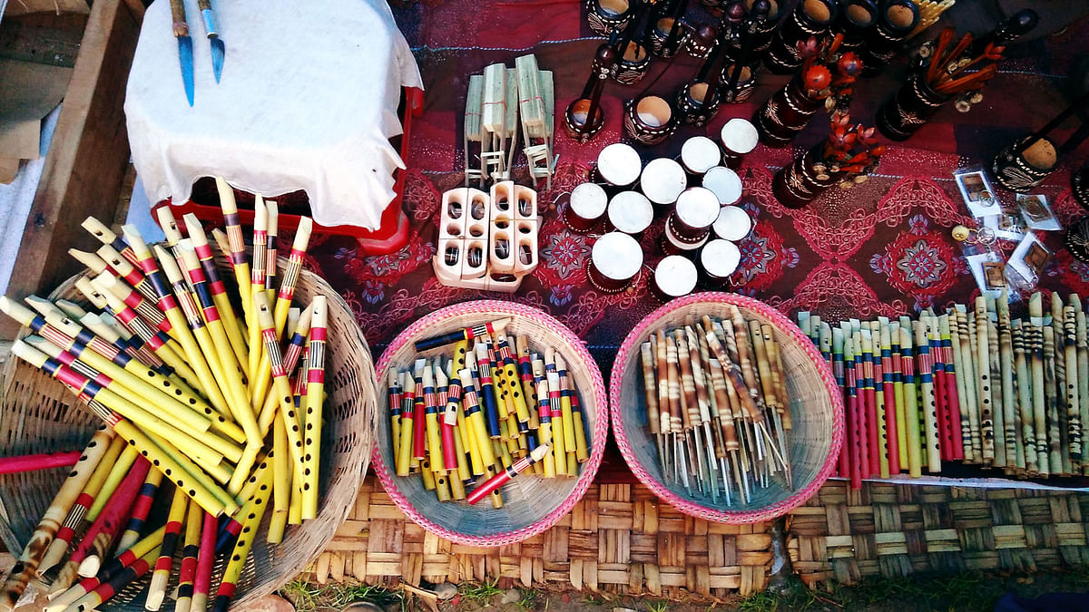 Different kinds of local musical instruments are displayed at a shop during a fair, `Baishakhi Mela`, on Bangla Academy premises on Saturday. Photo: Toriqul Islam