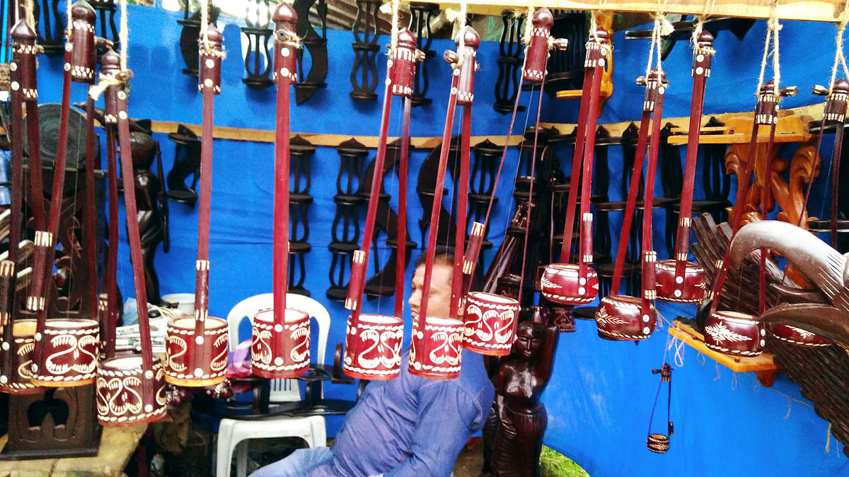 Musical instruments are displayed at a shop during a fair, `Baishakhi Mela`, on Bangla Academy premises on Saturday. Photo: Toriqul Islam
