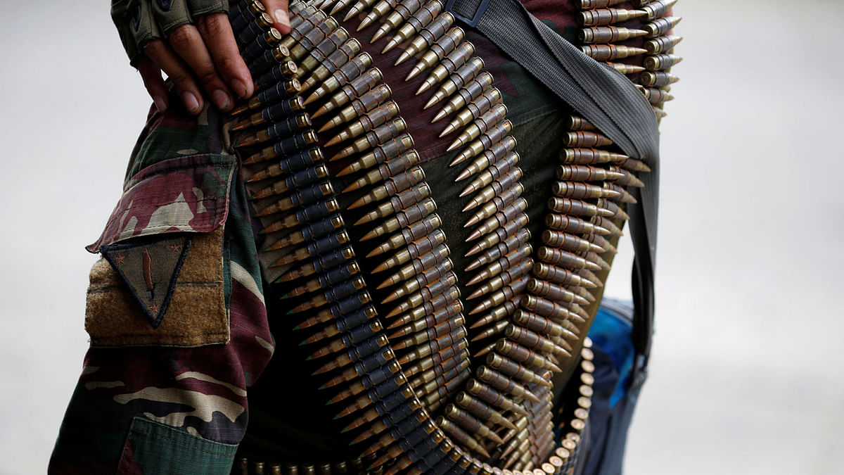 A close-up of a government soldier`s bullet bandoliers is seen, as he arranges them on his shoulder, while advancing his position in Marawi City, Philippines May 28, 2017. Photo: Reuters