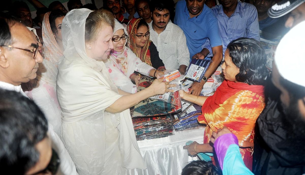 BNP chairperson and former prime minister Khaleda Zia distributes foods and clothes among destitute in the capital. Photo: BNP