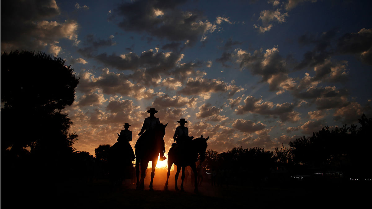 Pilgrims ride their horses during a pilgrimage in the shrine of El Rocio in Almonte, southern Spain June 2, 2017. Picture taken June 2, 2017. Reuters