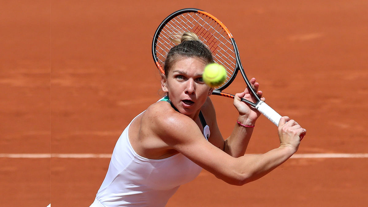 Romania`s Simona Halep in action during her quarter final match against Ukraine`s Elina Svitolina Reuters