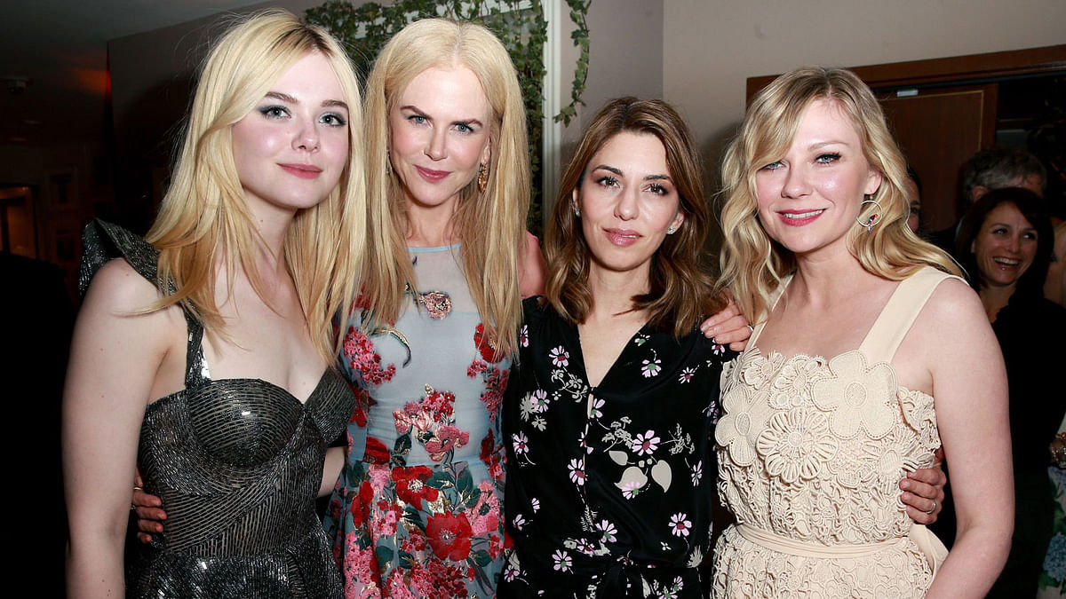 (L-R) Actors Elle Fanning, Nicole Kidman, director Sofia Coppola and actor Kirsten Dunst attend the after party for the premiere of Focus Features` `The Beguiled` at Sunset Tower Hotel on June 12, 2017 in Los Angeles, California. AFP