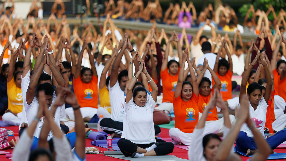Participants perform yoga at an event to mark the International day of Yoga in Colombo, Sri Lanka 17 June, 2017. Reuters