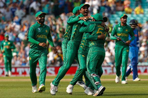 Pakistan`s players celebrate their victory over India on the pitch after the ICC Champions Trophy final cricket match between India and Pakistan at The Oval in London on June 18, 2017.  AFP