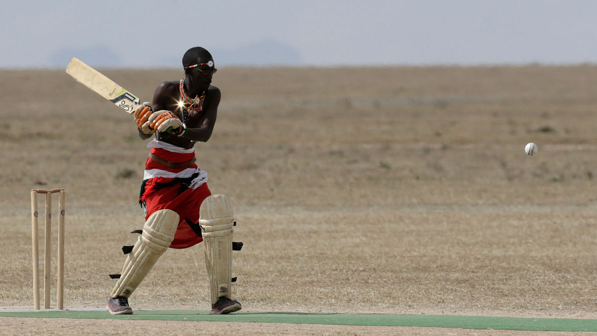 Francis Ole Meshami, captain of the Maasai Cricket Warriors bats against the British Army Training Unit (BATUK) cricket team during a charity tournament called the `Last Male Standing Rhino Cup` at the Ol Pejeta Conservancy in Laikipia. Reuters