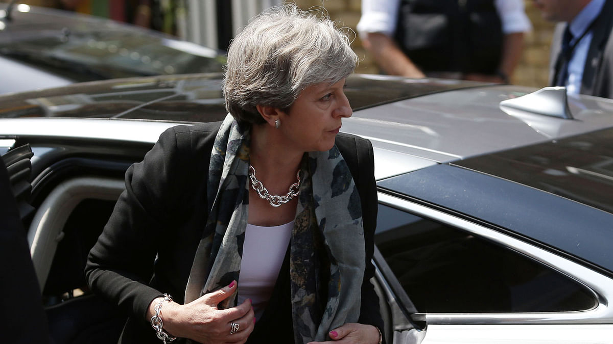 British prime minister Theresa May arrives at Finsbury Park Mosque in the Finsbury Park area of north London, on 19 June, 2017, after a vehicle was driven into pedestrians nearby. Photo: AFP