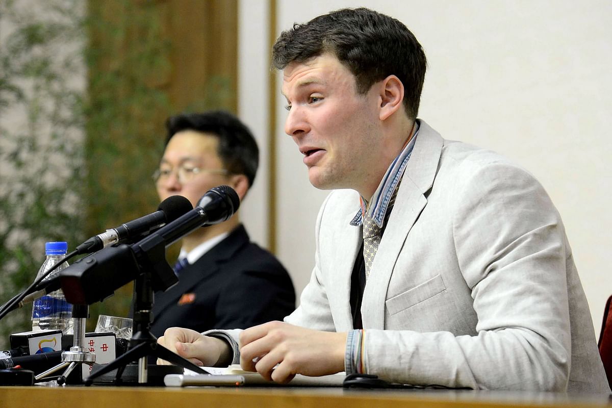 US student Otto Frederick Warmbier ®, who was arrested for committing hostile acts against North Korea, speaking at a press conference in Pyongyang. AFP file photo
