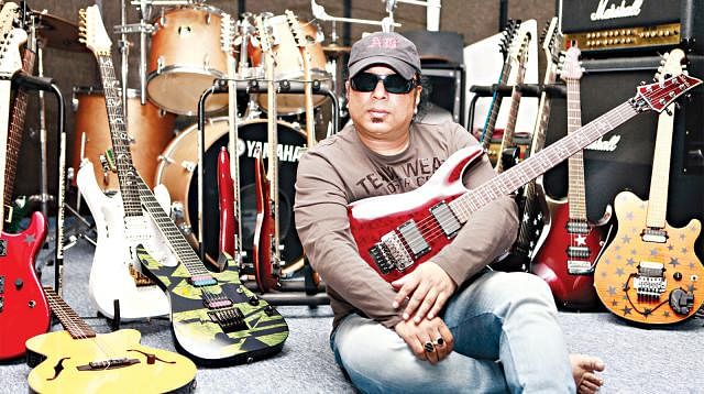 Ayub Bachchu with his favourite guitars