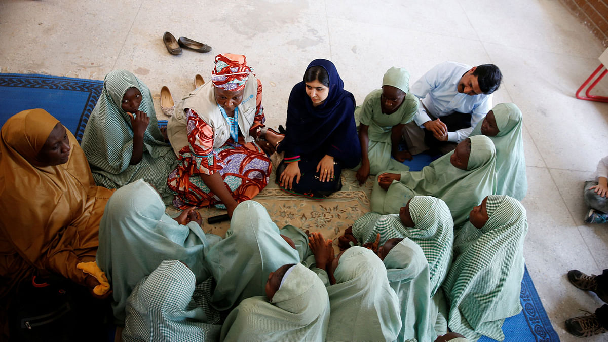 Nobel laureate Malala Yousafzai seen in a group discussion with some of the student of Yerwa Girls school in Maiduguri, Nigeria July 18, 2017. Reuters