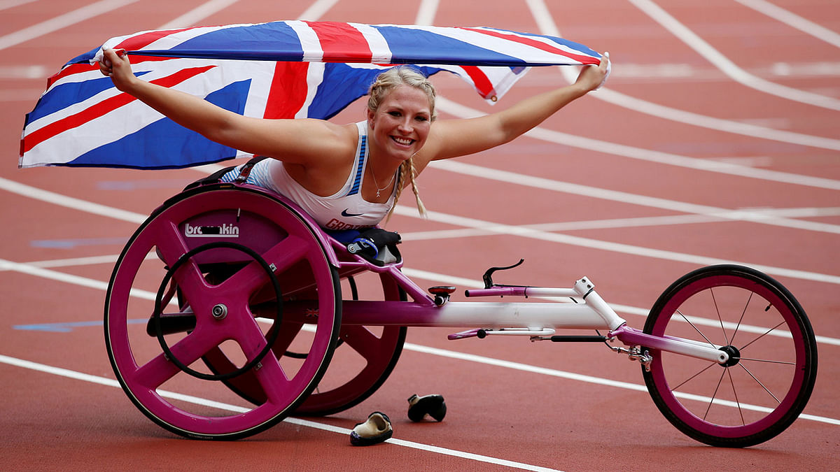 Great Britain`s Samantha Kinghorn celebrates winning the Women`s 100m T53 Final. Reuters