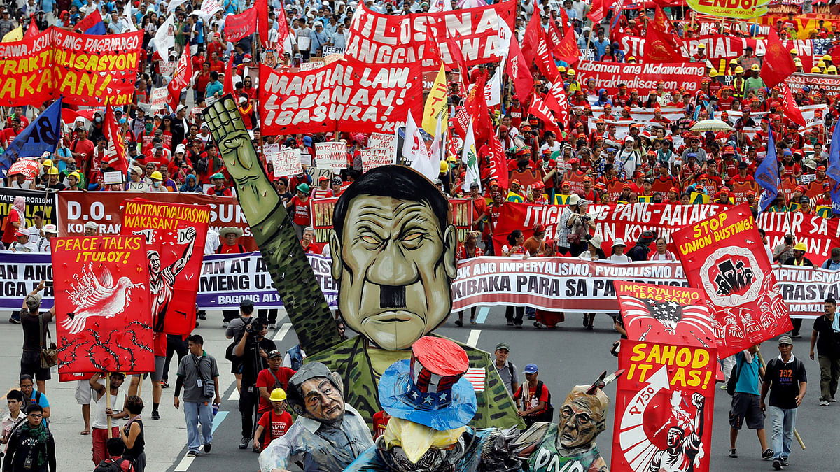 Anti-government protesters display an effigy of President Rodrigo Duterte during a march towards the Philippine Congress ahead of Duterte`s State of the Nation address in Quezon city, Metro Manila. Reuters