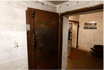 An entrance to the exhibition entitled `Hitler - How Could it Happen?` about German Nazi leader Adolf Hitler is pictured during a media tour in a World War Two bunker in Berlin, Germany, 27 July 2017. Photo: AFP
