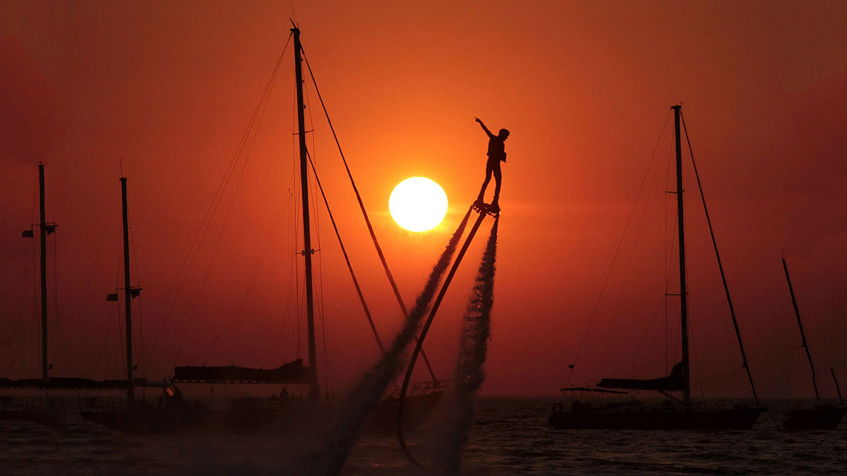 A man practices flyboarding in Crimea. Reuters