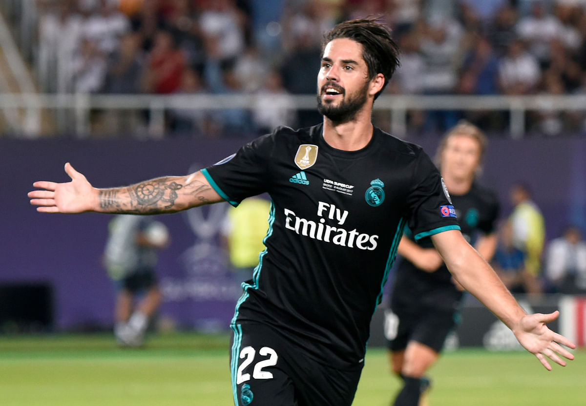 Real Madrid’s Spanish midfielder Isco celebrates after scoring a goal during the UEFA Super Cup football match between Real Madrid and Manchester United at the Philip II Arena in Skopje. Photo: AFP
