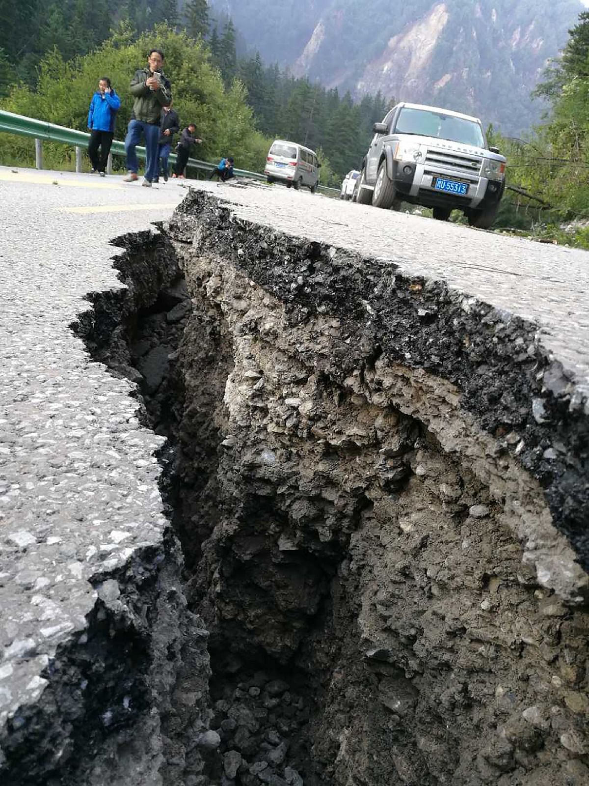 A crack, caused by an earthquake, is seen on a road in Jiuzhaigou in China’s southwestern Sichuan province. Photo: AFP