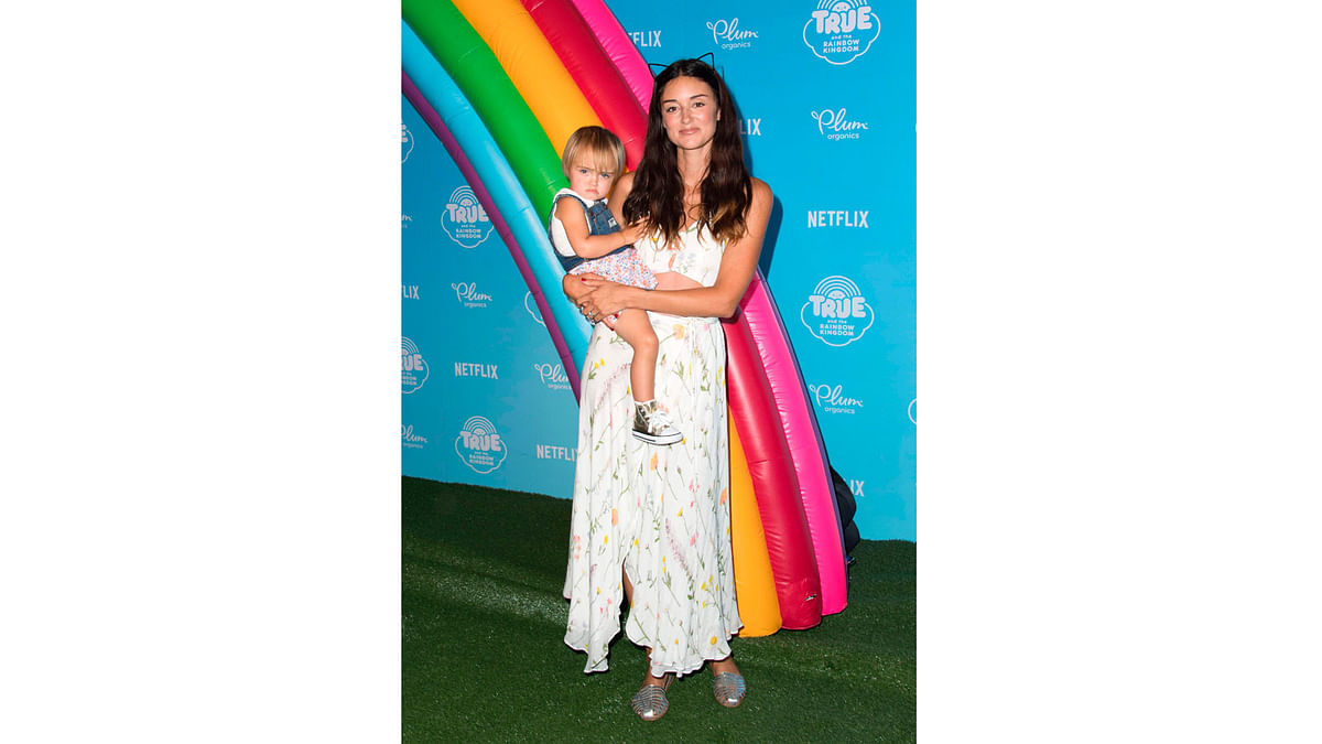 DJ Caroline D`Amore and daughter Isabella attend the Netflix Original Series `True and The Rainbow Kingdom` Sneak Peek on August 10, 2017, in Los Angeles, California. AFP