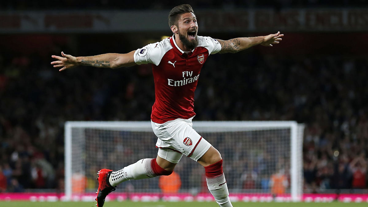 Arsenal’s French striker Olivier Giroud celebrates scoring Arsenal’s fourth goal during the English Premier League football match between Arsenal and Leicester City at the Emirates Stadium in London. Photo: AFP