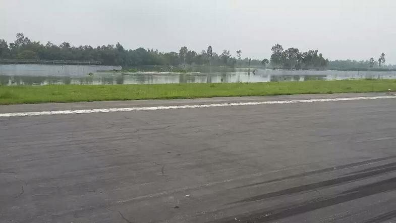 Floodwaters enter Syedpur Airport as its boundary wall disintegrated. Runway of the airport is about to be inundated. Photo: Prothom Alo