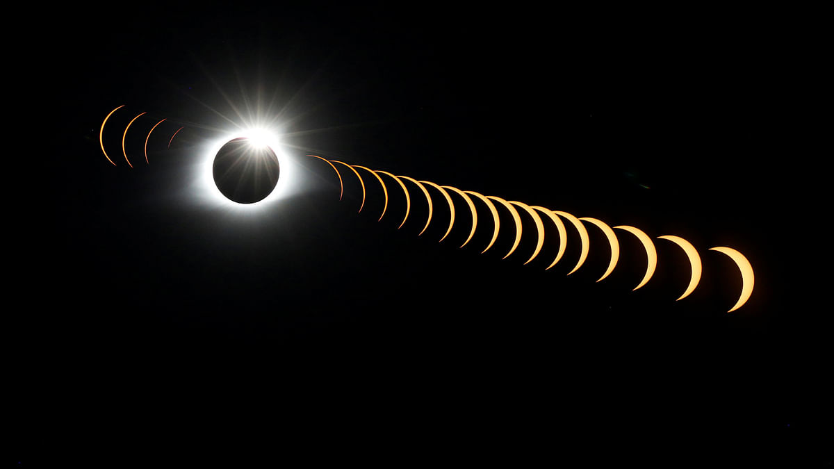 A composite shows a portion of the phases of the total solar eclipse Monday August 21, 2017 in Madras, Oregon. Emotional sky-gazers stood transfixed across North America Monday as the Sun vanished behind the Moon in a rare total eclipse that swept the continent coast-to-coast for the first time in nearly a century. AFP