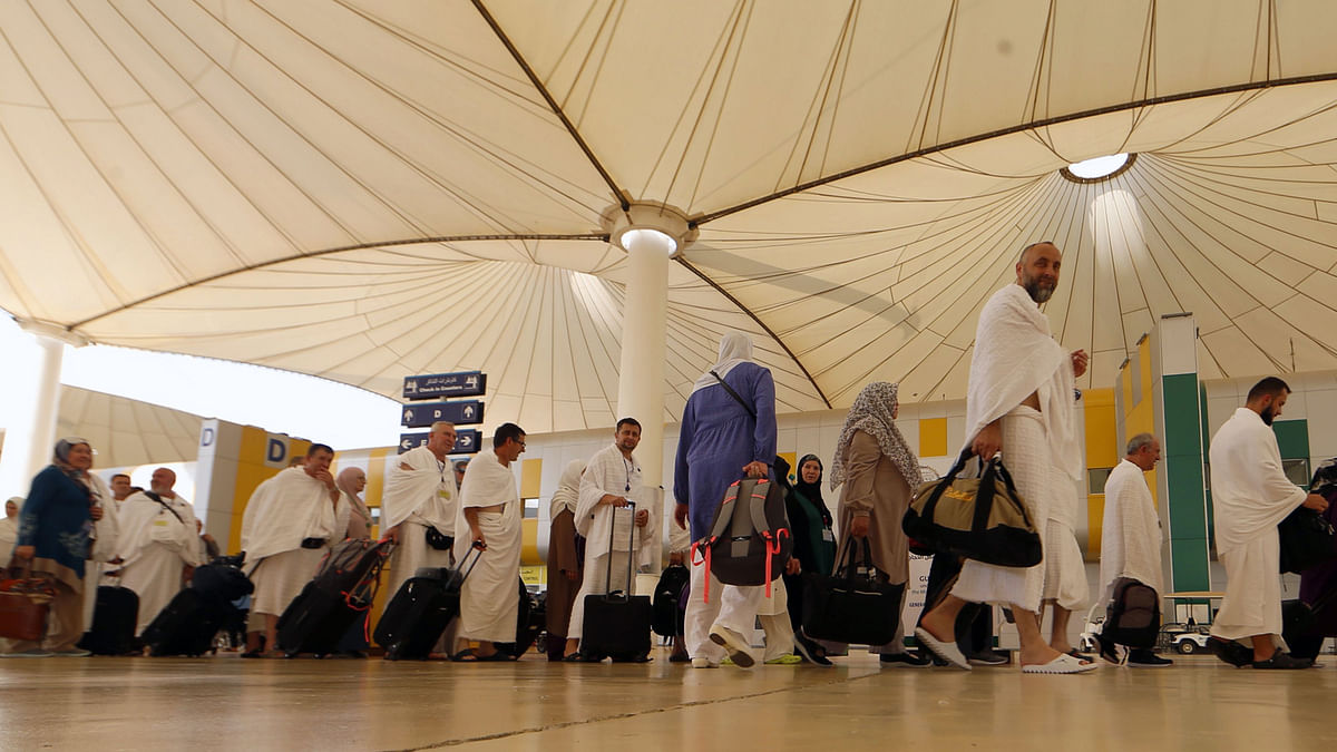 Muslim pilgrims arrive at Jeddah airport, prior to the start of the annual Hajj pilgrimage in the holy city of Makkah. Photo:  AFP