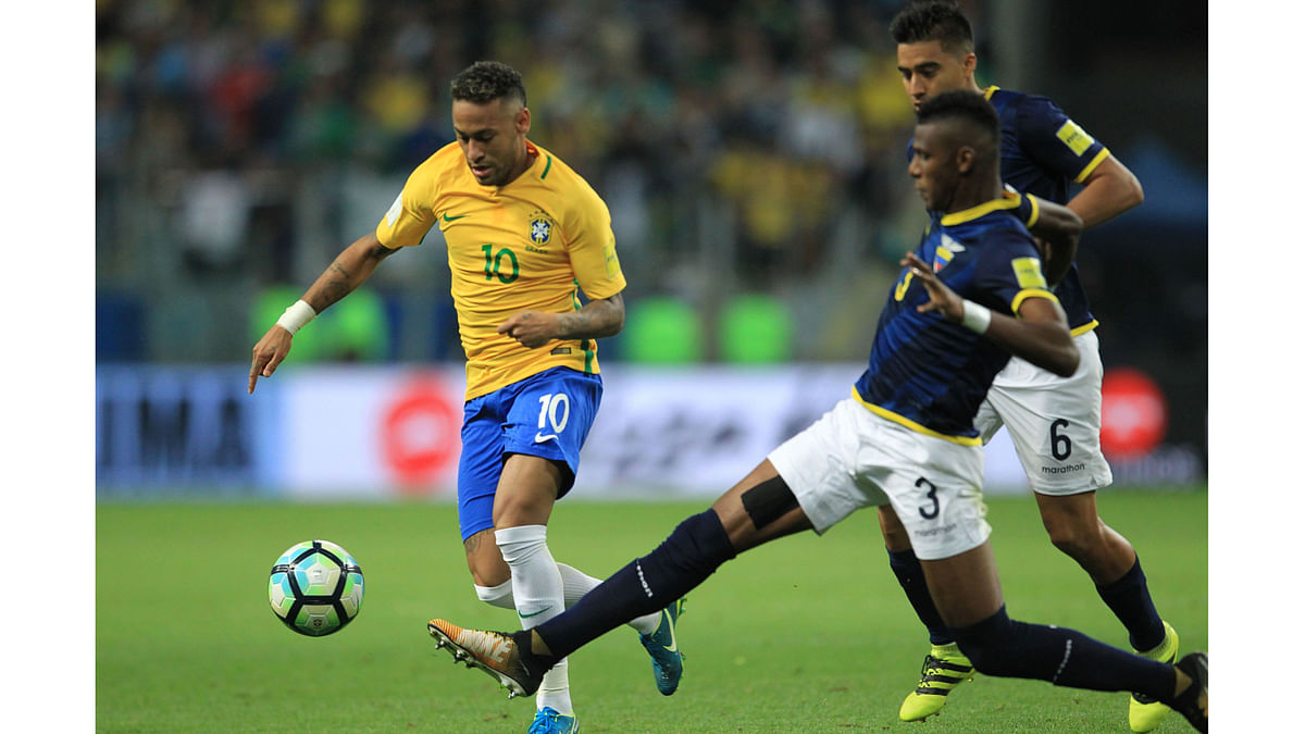 Brazil`s Neymar (L) is marked by Ecuador`s Robert Arboleda during their 2018 World Cup qualifier football match in Porto Alegre, Brazil, on August 31, 2017. AFP