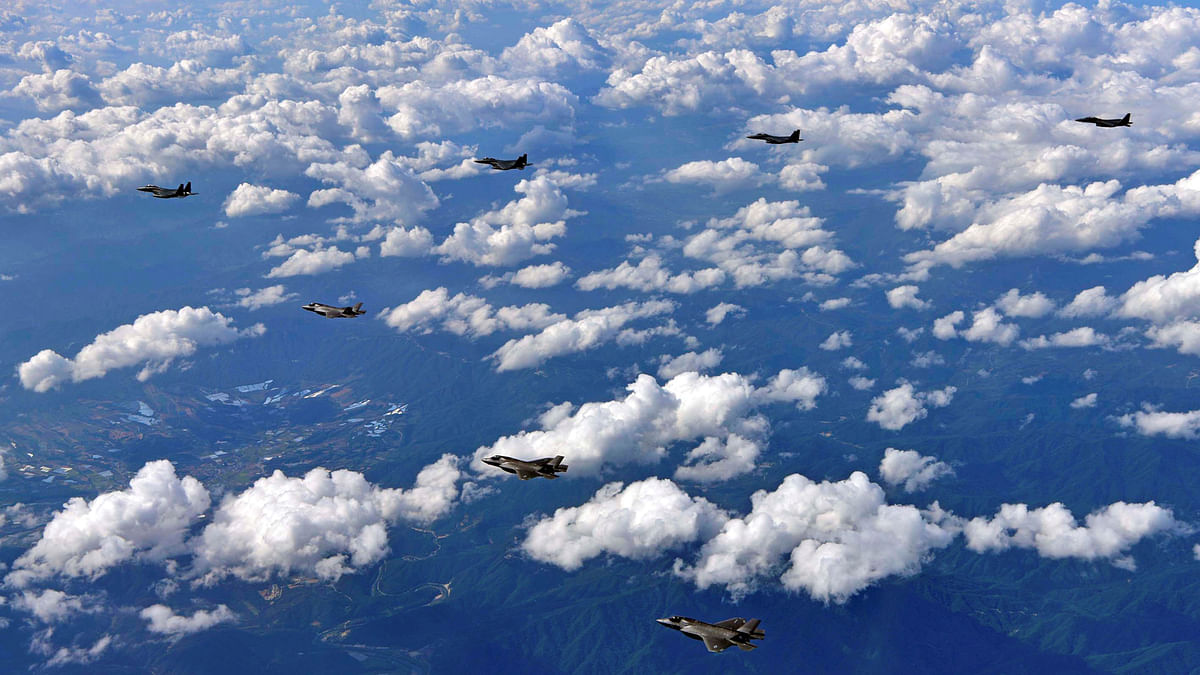 U.S. Marine Corps F-35B fighter jets and South Korean air Force`s F-15K fly over South Korea during a joint military drill. Reuters