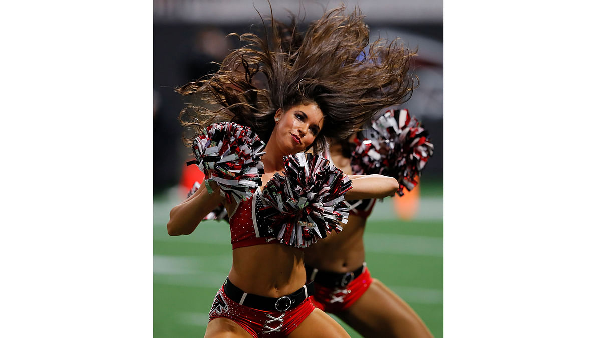 An Atlanta Falcons cheerleader performs during the game between the Atlanta Falcons and the Jacksonville Jaguars at Mercedes-Benz Stadium on August 31, 2017 in Atlanta, Georgia. AFP