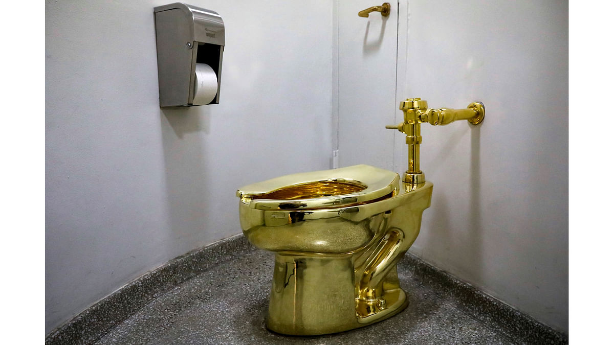Maurizio Cattelan’s “America,” a fully functional solid gold toilet is seen at The Guggenheim Museum in New York, US. Reuters