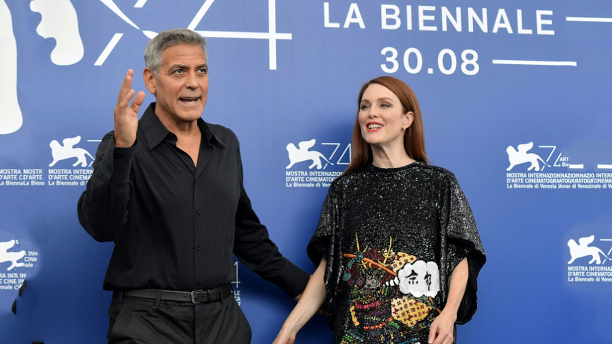 Hollywood stars George Clooney and Julianne Moore waded into the US row over Confederate symbols as they attended the Venice Film Festival where they promoted Clooney`s `Suburbicon` in which Moore stars. Photo: AFP