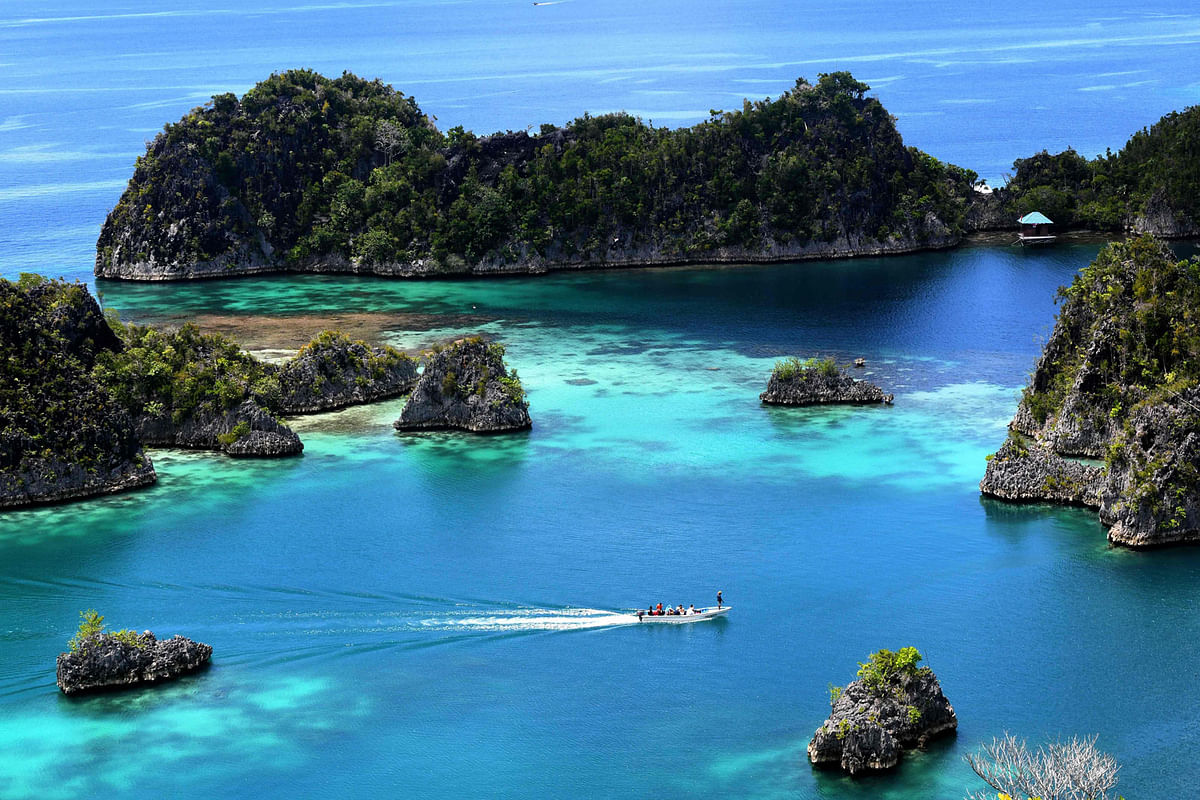 This photo taken on August 21, 2017 shows the blue sea around Raja Ampat -- which means Four Kings in Indonesian, in Indonesia`s far eastern Papua. AFP