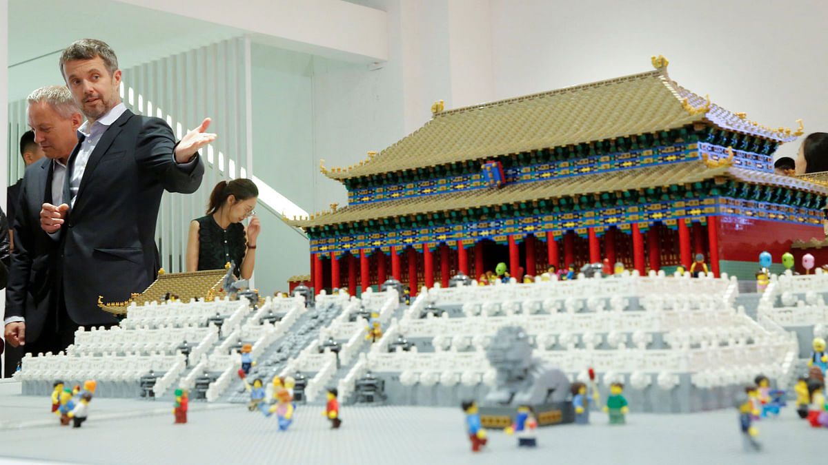 Danish Crown Prince Frederik looks at a model of the Forbidden City made of Lego bricks at the Danish Cultural Center at the 798 art district in Beijing, China, 23 September 2017. Photo: Reuters