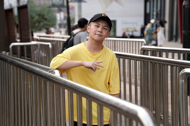 Li Yijie, a member of the Sichuan-based rap band Tianfu Shibian, poses for a photo ahead of Reuters interview in Beijing, China August 10, 2017. Picture taken August 10, 2017. REUTERS
