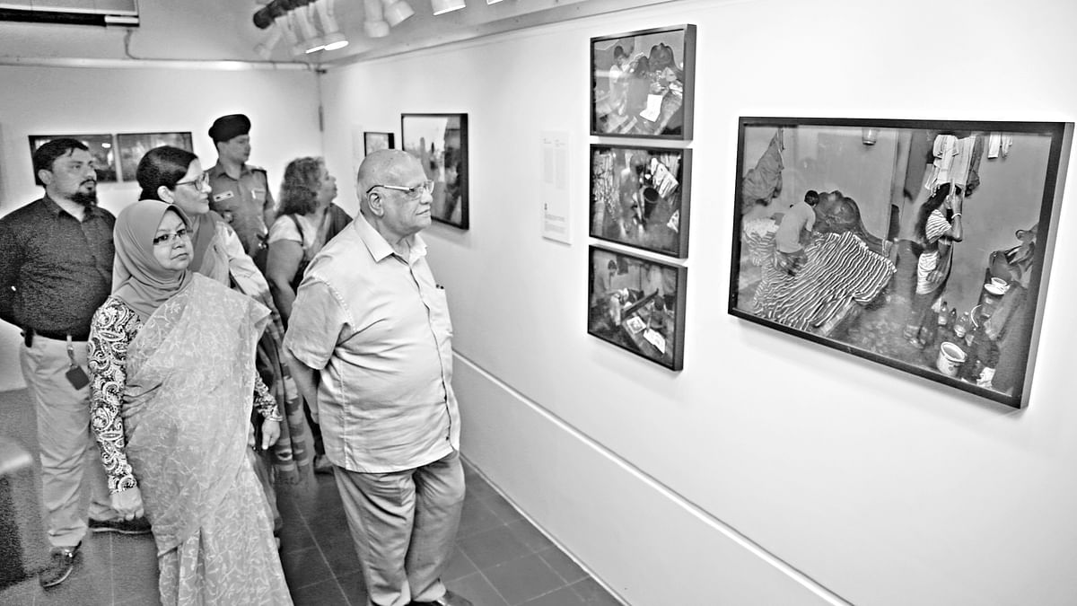 Finance minister AMA Muhith visits a photo exhibition arranged by ActionAid Bangladesh titled 'Different Images of Men' at Drik Gallery on Saturday. Photo: Prothom Alo